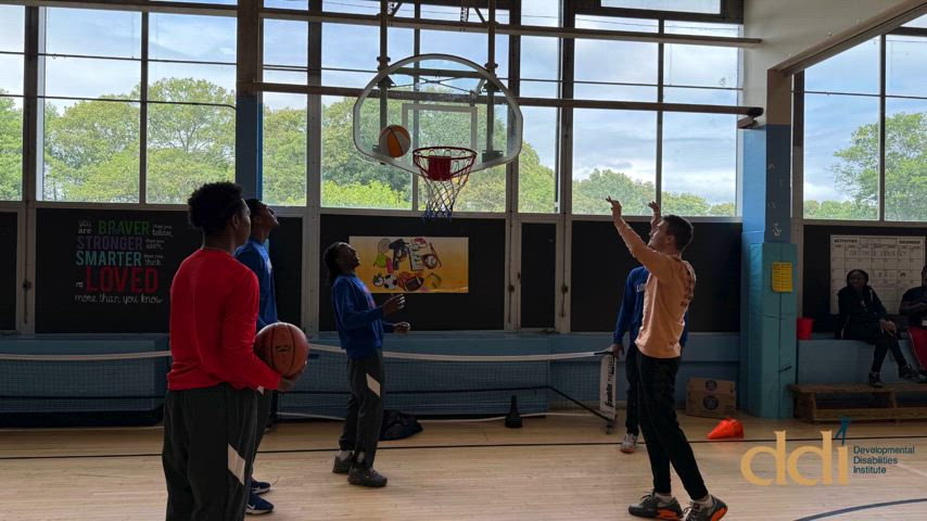 Slideshow of LI Nets players and students from Developmental Disabilities Institute (DDI) engaging in basketball activities