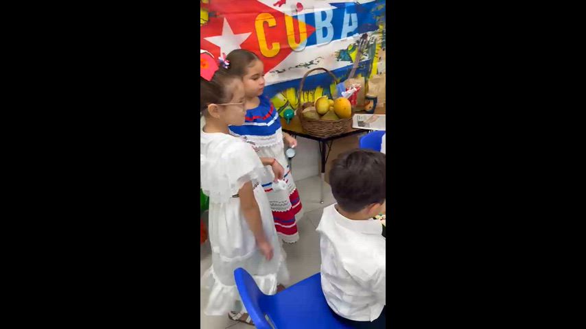 Hispanic Heritage Month Celebration 2025 Cuba. Kids are playing domino in national outfits