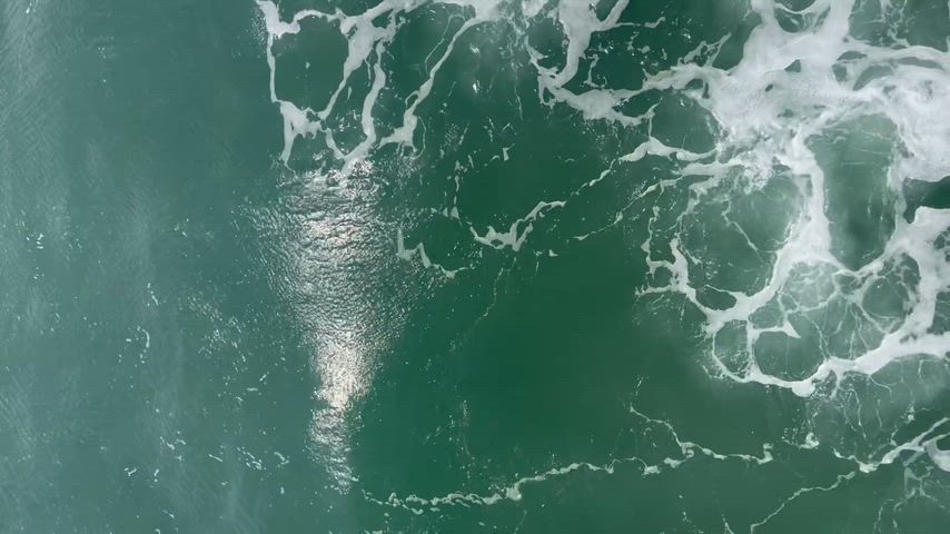 water at the beach waves crashing