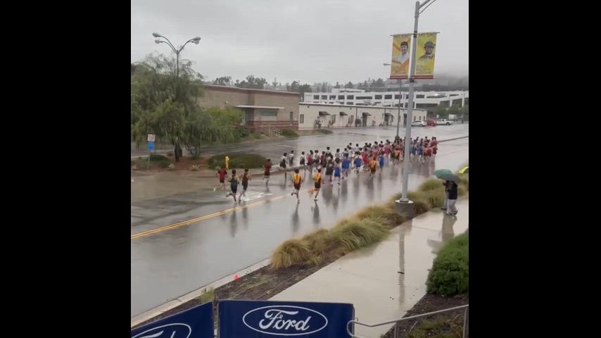 Students weather the rain to finish the race