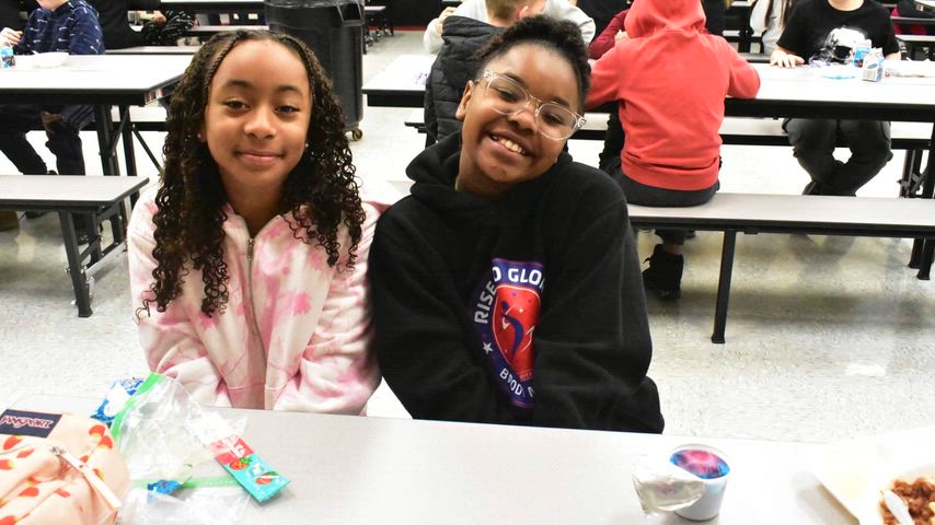 Students and staff photos doing different school activities. 