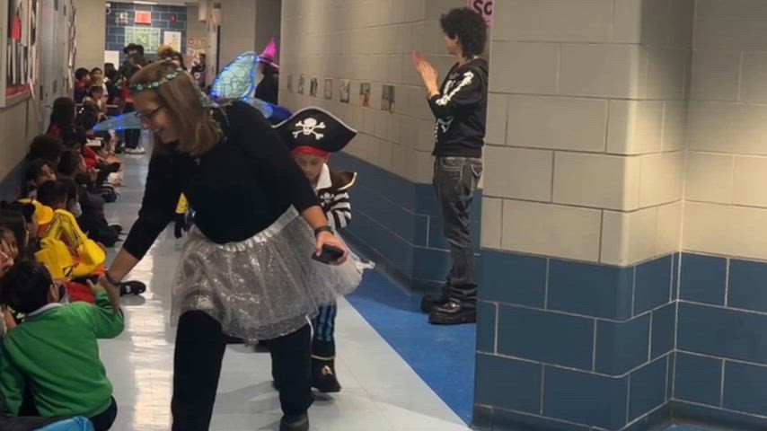 costumes students parade for halloween