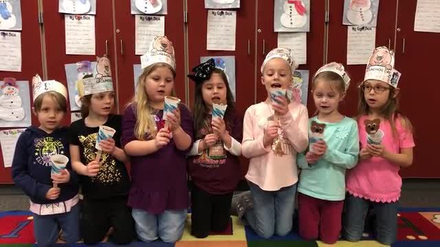 Kindergarten girls singing I'm A Little Groundhog.