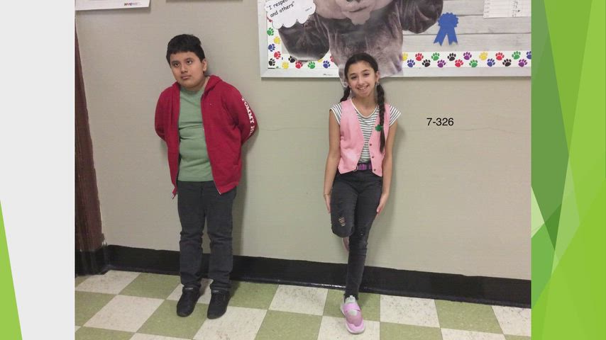 Students and Staff wearing green shirts 