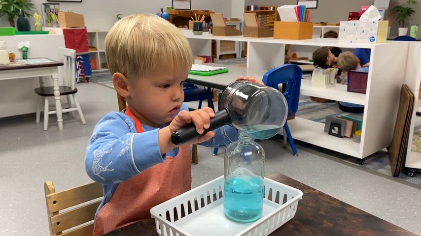 Montessori students working at various centers